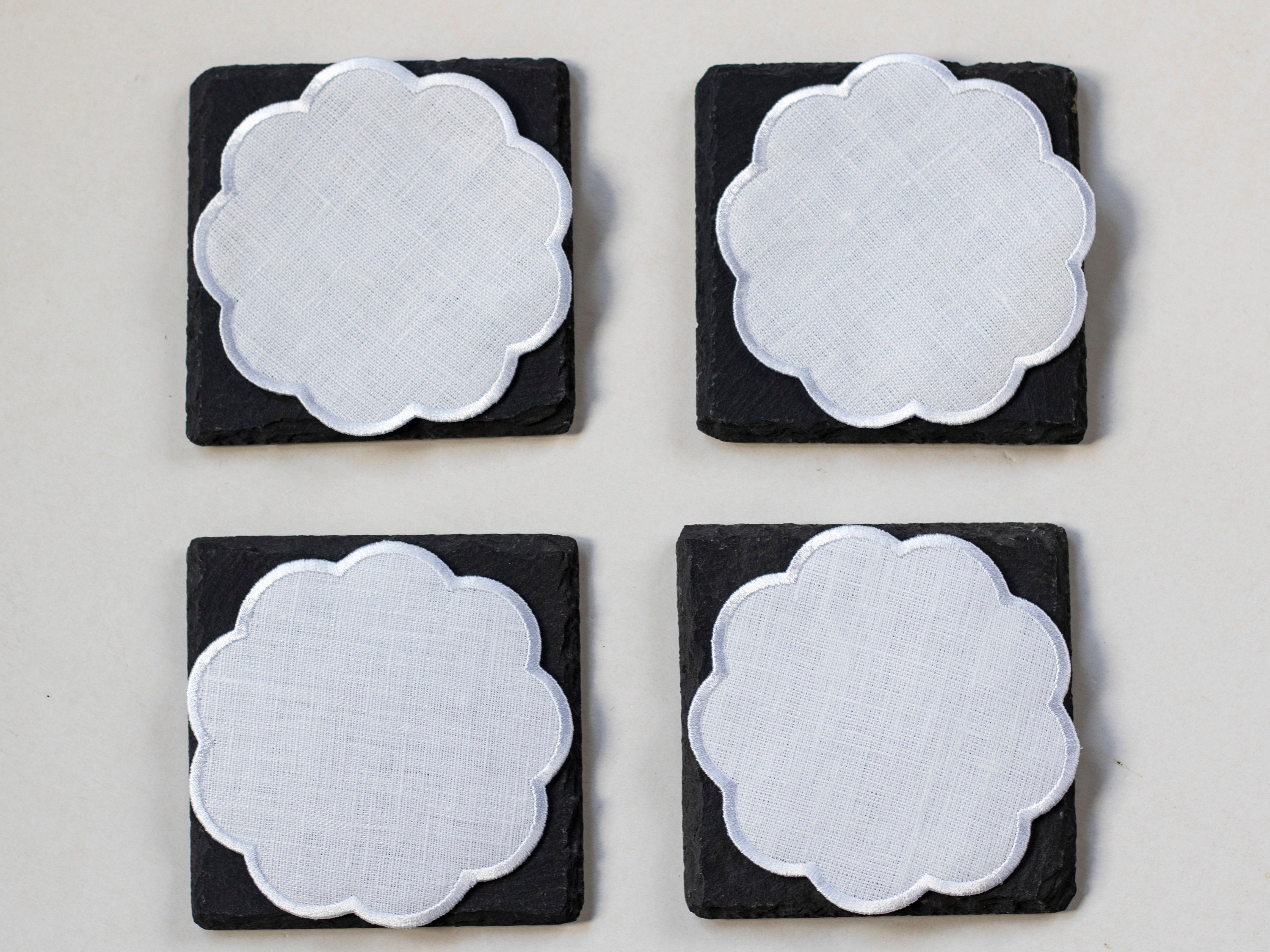 3.25 in Linen-Like Scalloped White Coasters With Wax Backing 1000 ct.