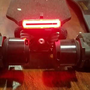 eSk8 laser light Longboard truck mount  - Skateboard laser light mount, fits Meilan X5/Oricycle bicycle light