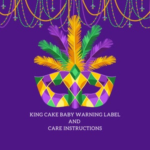 May include: A purple, green, and gold Mardi Gras mask with feathers. The text below reads "King Cake Baby Warning Label and Care Instructions".