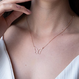 The initial butterfly necklace