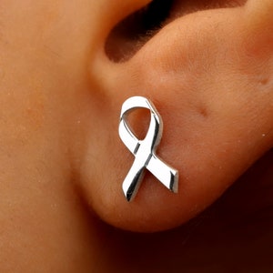 Silver ribbon earrings in the shape of a ribbon.