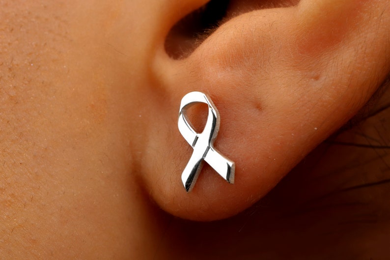 Silver ribbon earrings in the shape of a ribbon.