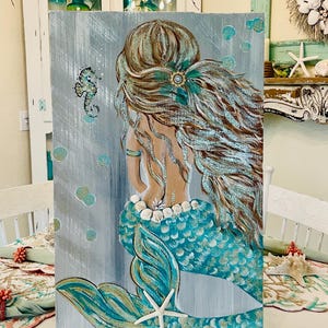Mermaid with Red hair in Aqua on wood.