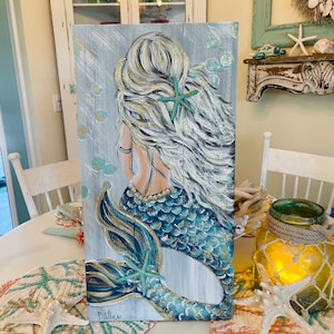 Mermaid painting on wood