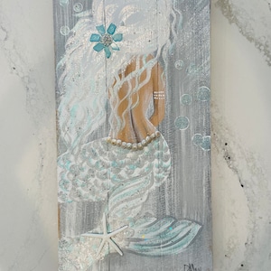 Original mermaid painting on wood.