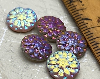 Five Czech glass dahlia flower beads in purple and yellow with iridescent finish, shown next to a wooden ruler for scale.