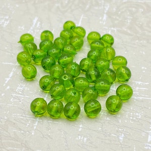 Czech Glass Druk Beads: 6mm Transparent Bright Green Crystal Spacers (Pack of 40)