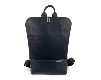 waterproof city backpack made of artificial leather in black antique unisex