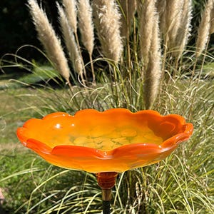 A Bright Orange Bird Bath Blown Glass Art. A Beautiful Addition to the Floral Garden.  Signed by the Artist.