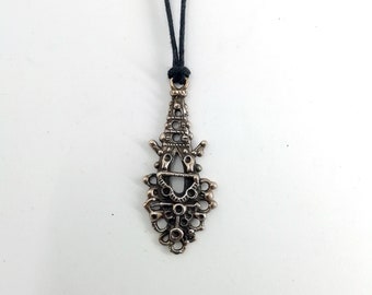 One-off solid bronze ethnic style pendant necklace. Handmade and handcast.