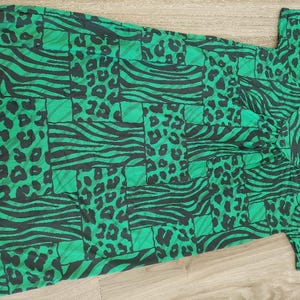 Small Adult green and black animal print