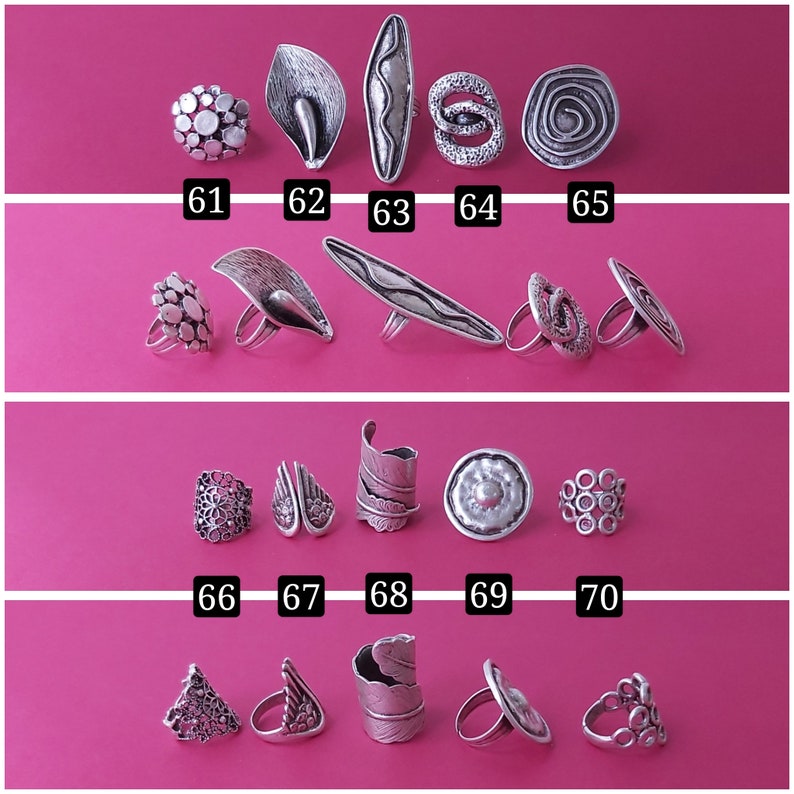 May include: A collection of 10 silver rings with various designs, including floral, geometric, and abstract patterns. The rings are arranged in four rows on a pink background, numbered 61 through 70.