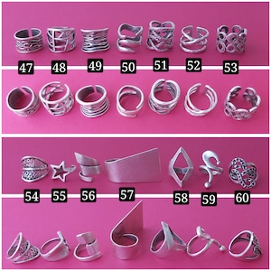 May include: A collection of 20 silver rings with various designs, including geometric shapes, stars, and swirls. The rings are arranged in three rows on a pink background. The numbers 47 through 60 are printed below each ring.