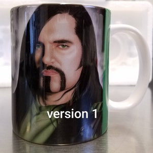 An 11 oz ceramic mug with a drawing of Peter Steele printed on it. Type O Negative