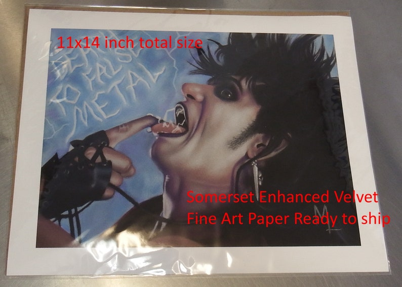 May include: A black and white illustration of a person with dark hair and a black leather glove. The person is licking their finger and the background is blue with the words "FALSO METAL" written in white. The image is printed on Somerset Enhanced Velvet Fine Art Paper. The print is 11 inches by 14 inches.