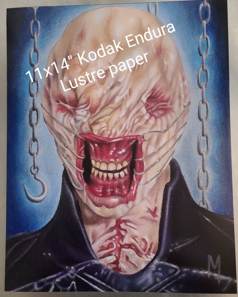 May include: A detailed drawing of a monstrous creature with a large, open mouth and a chain wrapped around its head. The drawing is done in colored pencil on 11x14" Kodak Endura Lustre paper.
