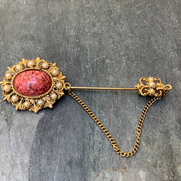 rare find Pauline Rader original brooch with a beautiful natural stone. See video to see the beautiful stone. Mint condition.