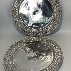 New 2 PEWTER serving plates - Set of 2 sold together- measuring 12 1/4 inches diameter. Brand new never used. MINT CONDITION.