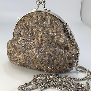 Vintage CACHE (gold label) beaded clutch bag- ABSOLUTELY stunning. Bag measuring 5 1/2 X 5 1/8 Mint condition-like NEW circa 1980’s.