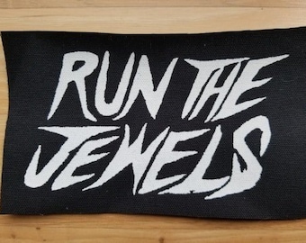 RUN the JEWELS, BIG black Sew-on Patch, 7 inches X  4.5 inches.