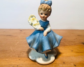 Vintage Napco Bisque Porcelain Girl with Yellow Bouquet Figurine