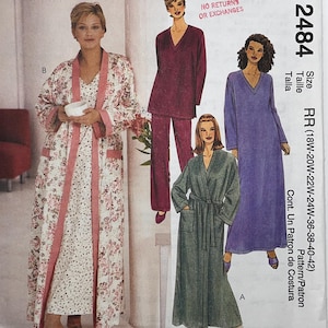 May include: A McCall's 2484 sewing pattern envelope for a robe and pyjama set. The cover features illustrations of a floral robe, a solid purple long-sleeved top with trousers, and a solid purple floor-length dress. Text includes McCall's 2484, Womanstyle.