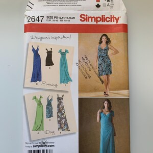 May include: Simplicity sewing pattern 2647, size P5, featuring illustrations of evening and day dresses. The pattern includes sizes 12, 14, 16, 18, and 20. The front of the pattern features the Simplicity logo and the text "Designer's inspiration!"