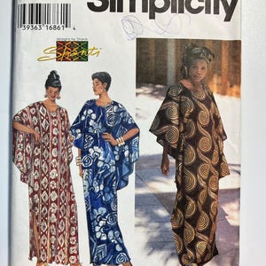 May include: A Simplicity 9659 sewing pattern envelope for a loose-fitting kaftan dress in size A. The cover features illustrations of three variations of the garment with different patterns, including geometric, floral, and spiral designs.