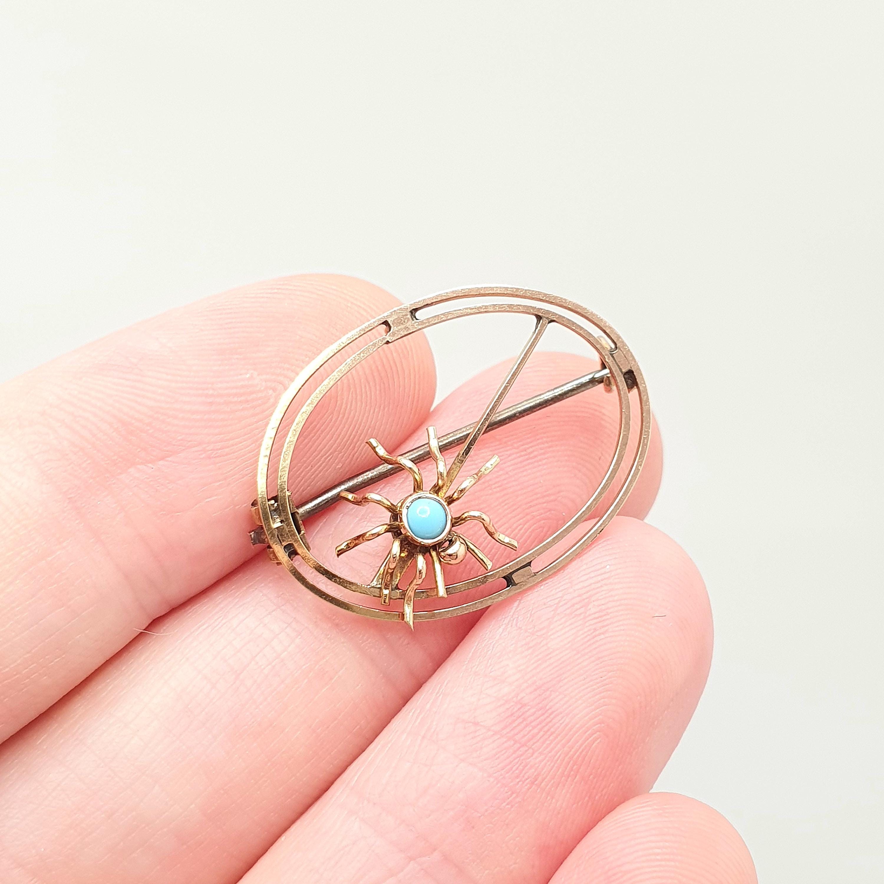 Broche araignée avec quartz blanc