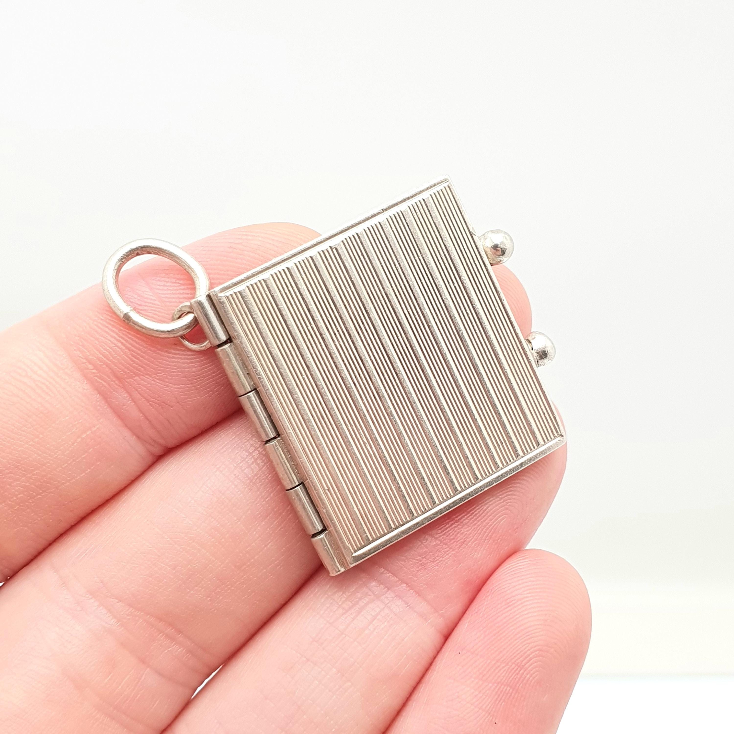 古いヴィンテージのソリッドシルバーブックロケットFRANZ SCHEURLE 