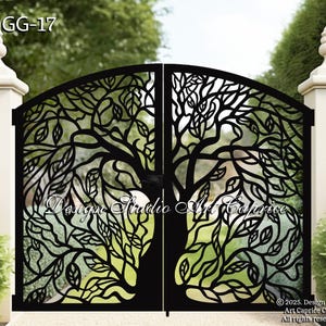 May include: Black metal garden gate with a tree design. The gate features a detailed cut-out pattern of a tree with leaves and branches. The gate is flanked by white pillars with decorative finials. The text "Design Studio Art Caprice" is visible.