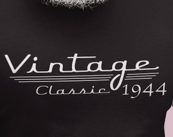 May include: Black t-shirt with white text that reads "Vintage Classic 1944".