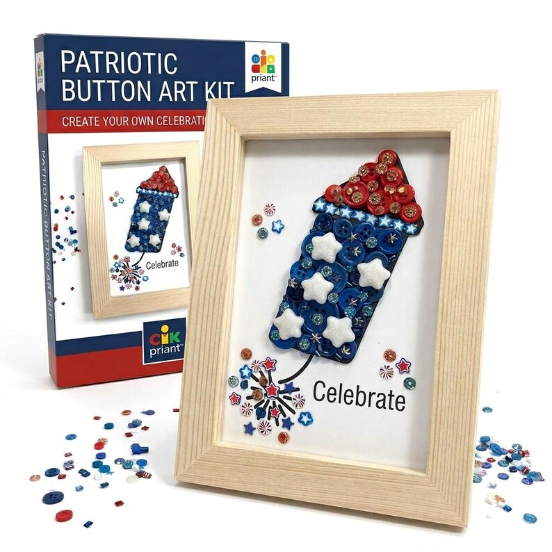 May include: A framed patriotic button art kit featuring a firework design made of red, white, and blue buttons and star-shaped embellishments. The text "Celebrate" is below the firework. The kit box reads "Patriotic Button Art Kit".