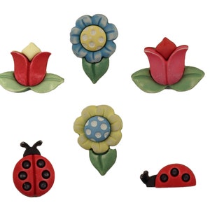 May include: Assortment of colorful flower and ladybug buttons. The buttons are made of plastic and have a 3D design. There are two red tulips, a blue flower, a yellow flower, and two ladybugs.