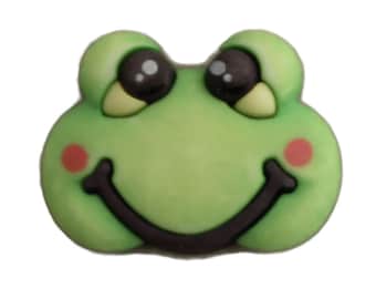 Puede incluir: Una cara de rana verde con ojos negros, una sonrisa negra y mejillas rosadas. La cara de rana está hecha de un material suave y flexible.