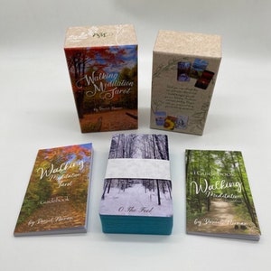 May include: A set of Walking Meditation Tarot cards with a guidebook. The cards feature nature scenes and the guidebook has a green cover with the title "Guidebook to Walking Meditation" by Daniel Norman.