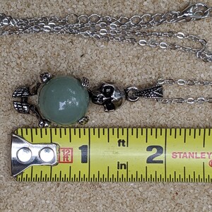 Necklace of a Skeleton Holding a Sphere of Jade...or Quartz, Obsidian, Blue Sandstone, Goldstone image 8
