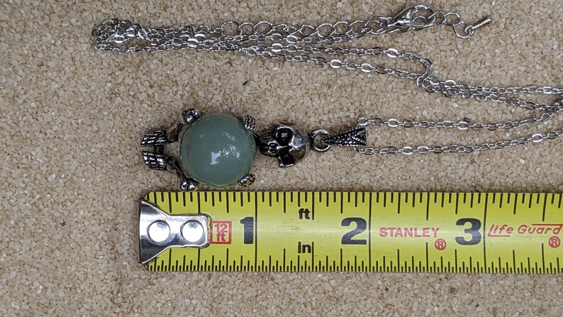 Necklace of a Skeleton Holding a Sphere of Jade...or Quartz, Obsidian, Blue Sandstone, Goldstone image 8