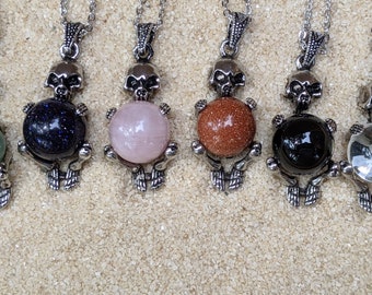 Necklace of a Skeleton Holding a Sphere of Jade...or Quartz, Obsidian, Blue Sandstone, Goldstone