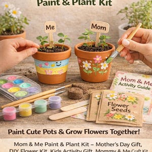 May include: A set of three ceramic mugs with a speckled, cream-colored glaze. Each mug features a different hand-painted floral design in shades of blue, green, and yellow. The mugs have a simple, modern shape.