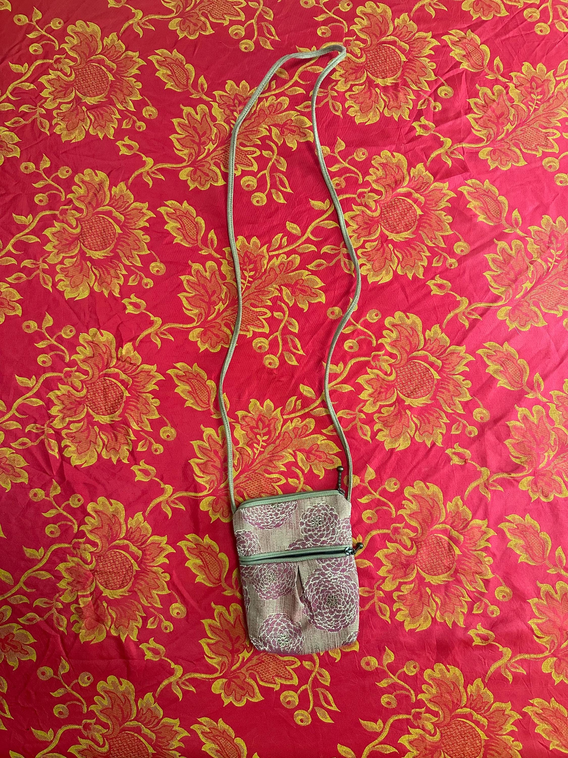 The City Girl crossbody is available in many unique Maruca  MARUCA Red Bark Cloth. City Girl. Crossbody Bag. main image 1