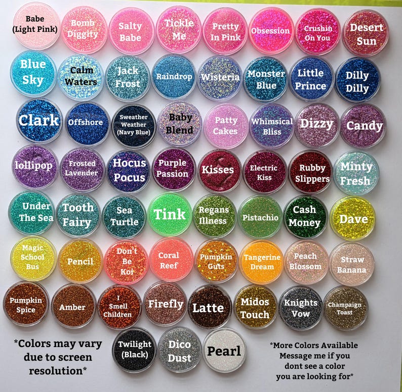 May include: A collection of circular containers filled with various coloured craft glitter, each labelled with unique names like Babe, Blue Sky, and Pearl. The display features a wide spectrum of hues including pinks, blues, greens, and oranges.