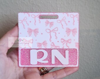 Corquette bow badge buddy| bow badge buddy| badge buddy custom| personalized badge| badge buddy nurse| badge buddy rn| glitter