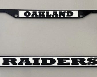 Oakland Raiders License Plate Frame: Silver or Black Metal