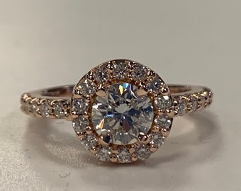 Ladies 14kt Round Center Cut Forever One Moissanite Cushion Halo Ring.