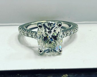 Ladies 14kt Round Brilliant Forever One 3 carat Moissanite Ring.