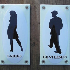 Classic Enamel Ladies & Gentlemen signs. Black figures on a white/cream background, 7x14cm. each.