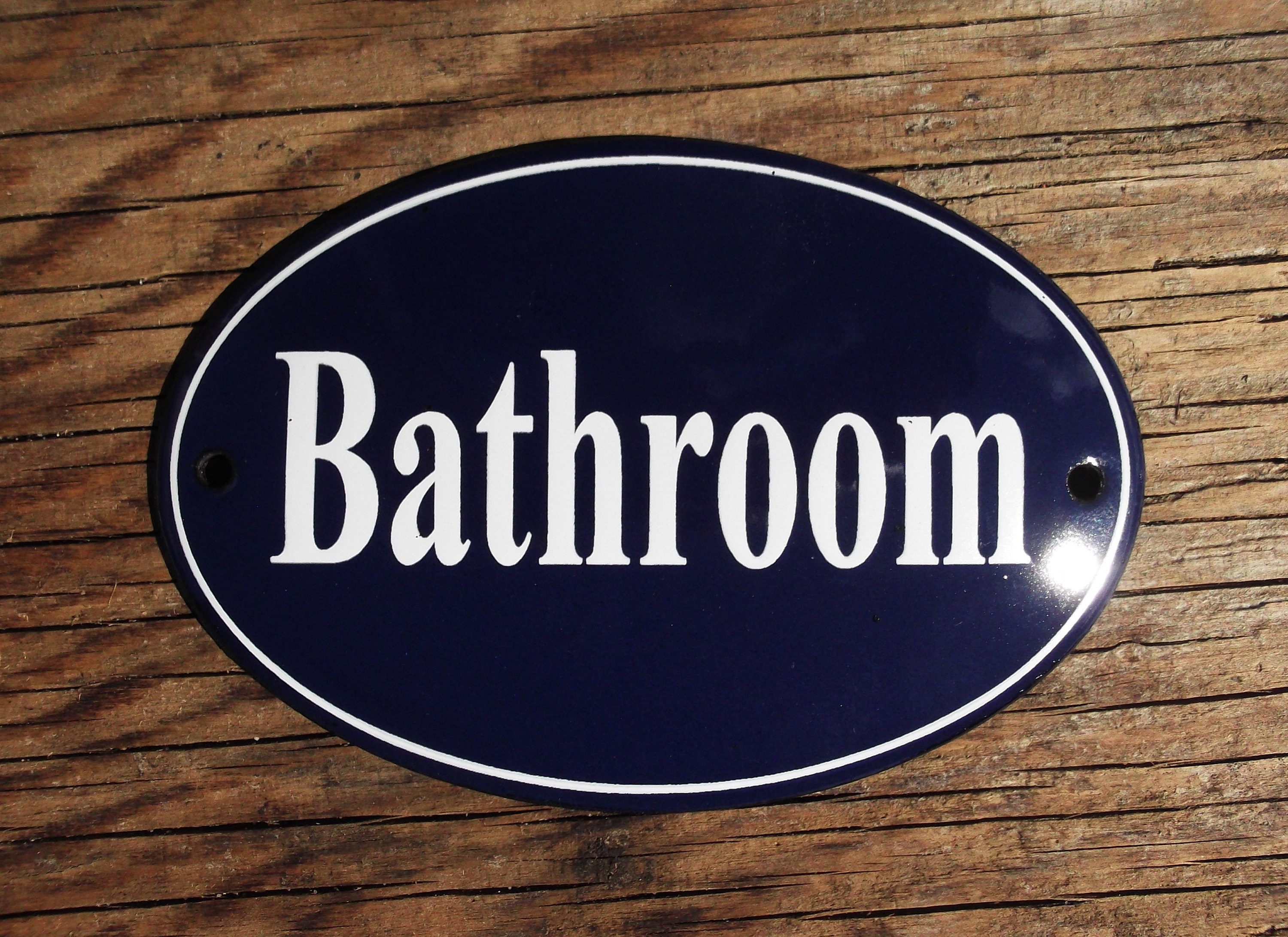 Classic Enamel WC bathroom sign 10x5cm. White text on a blue background