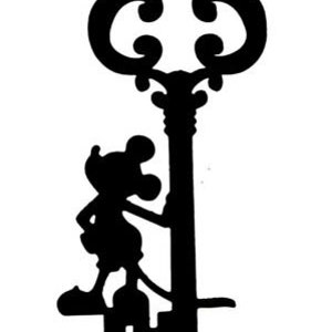 May include: Black silhouette of a cartoon mouse climbing a large ornate key.