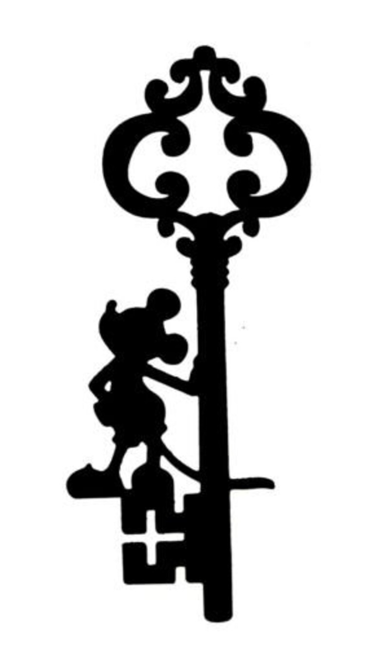 May include: Black silhouette of a cartoon mouse climbing a large ornate key.